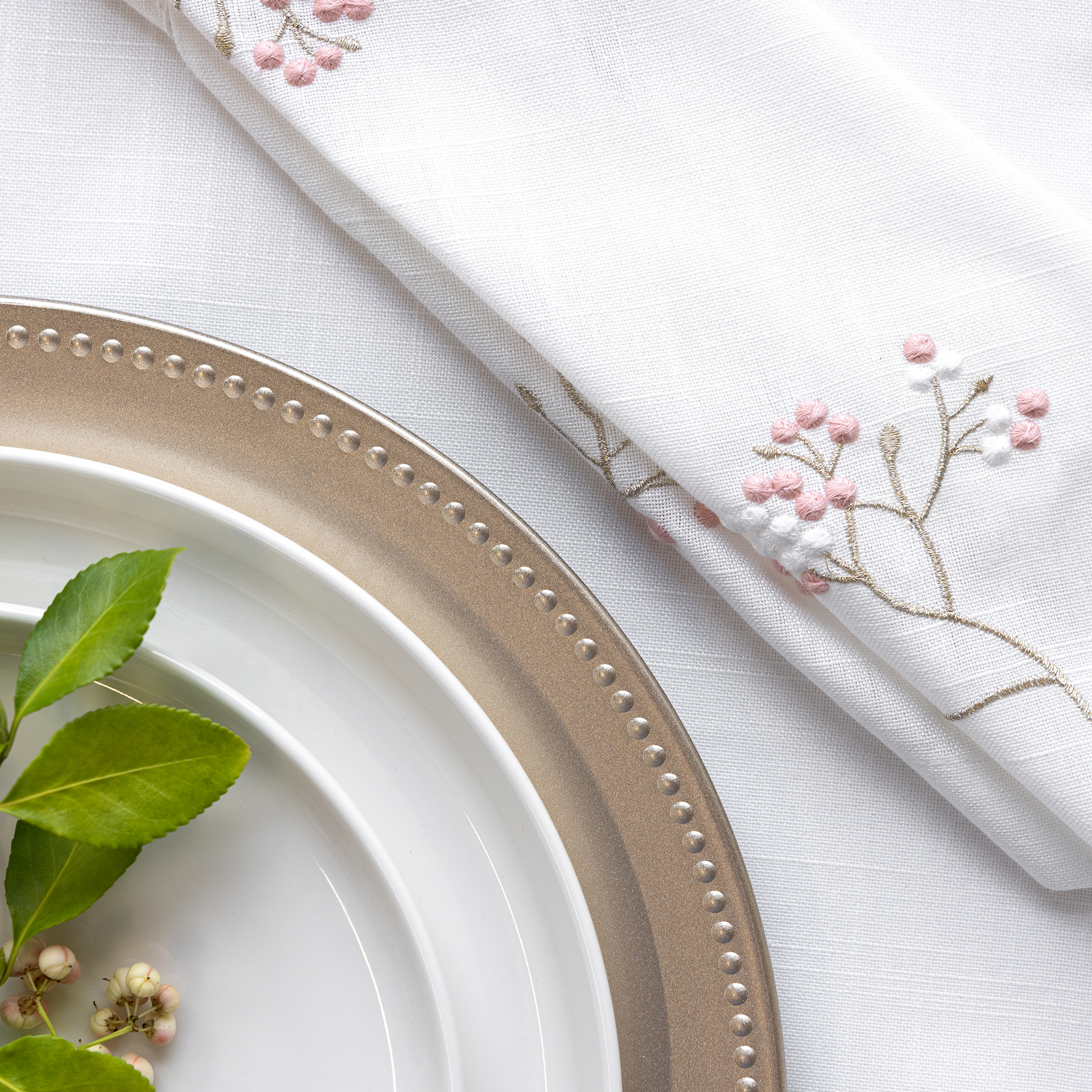 Sottopiatto decorativo Perline champagne 33 cm AMBITION